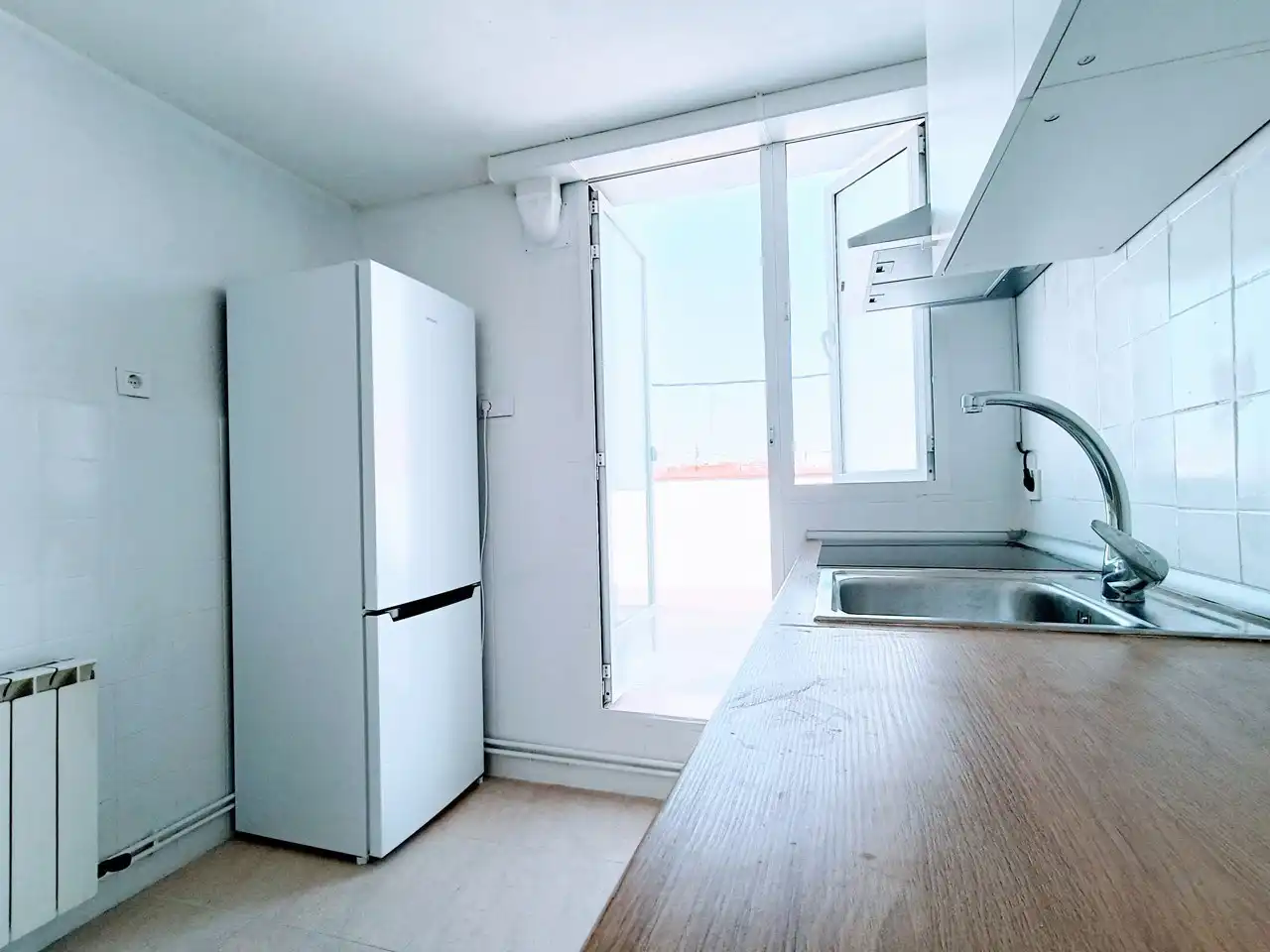 Küche von Dachboden zur Miete in Madrid mit Heizung und Waschmaschine