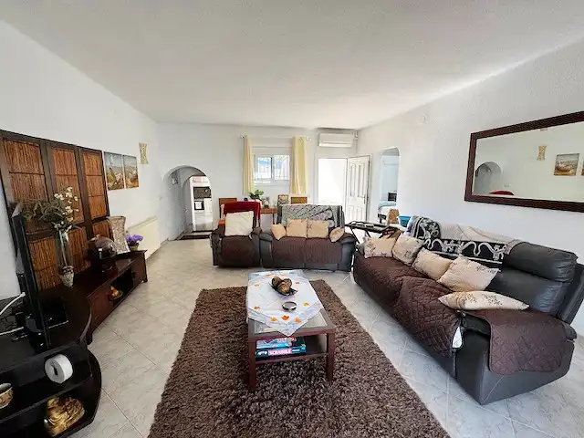 Sala de estar de Casa o chalet en venta en L'Escala con Aire acondicionado, Calefacción y Jardín privado