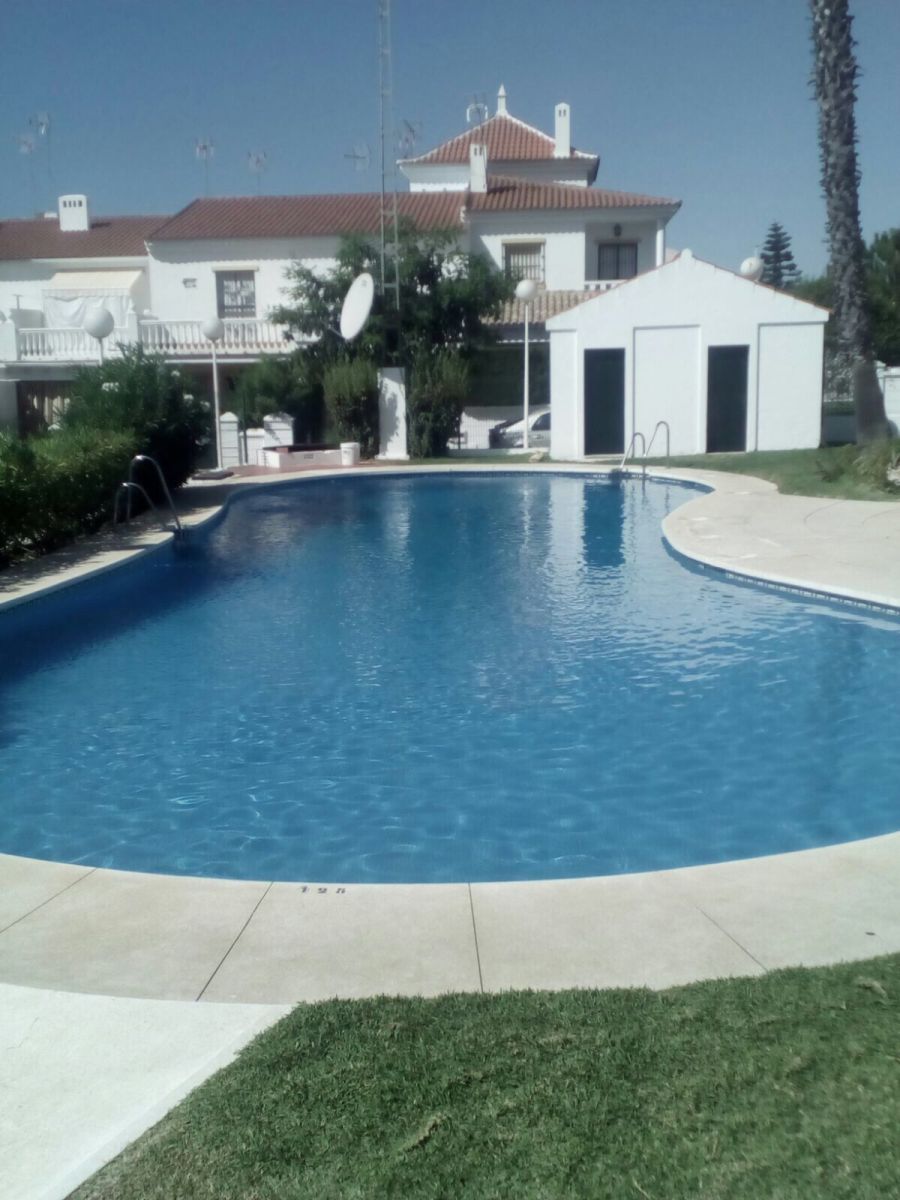Piscina de Casa adosada en venda en Islantilla amb Terrassa i Piscina comunitària