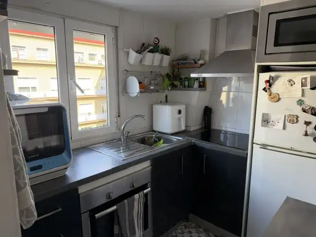 Kitchen of Attic for sale in Girona  with Heating, Oven and Microwave