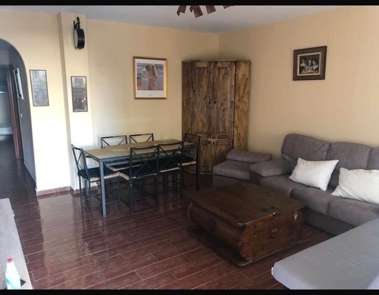Sala d'estar de Apartament en venda en Torremolinos amb Aire condicionat i Moblat