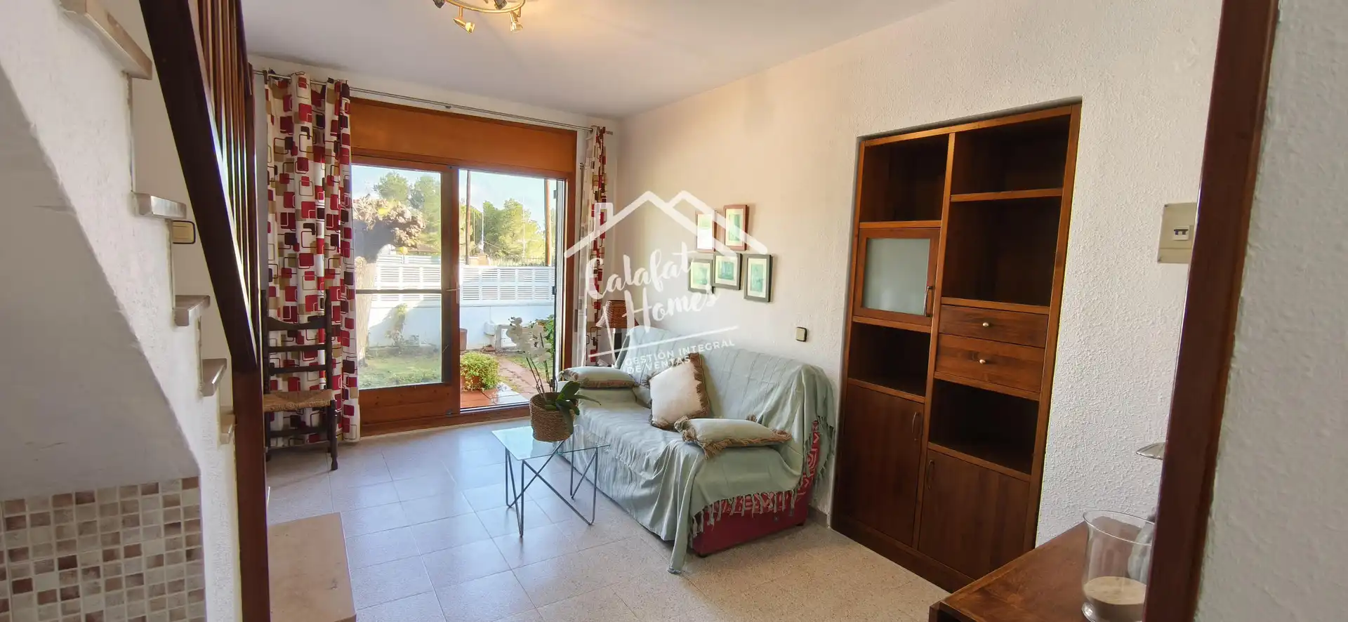 Sala d'estar de Casa o xalet en venda en L'Ametlla de Mar  amb Jardí privat, Terrassa i Piscina