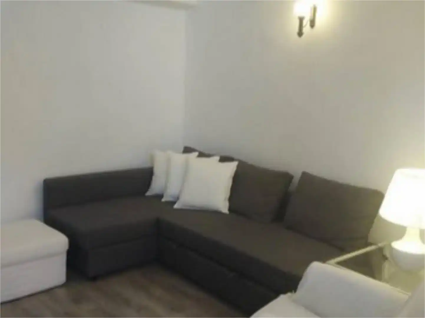 Sala de estar de Casa adosada en venta en Valdealgorfa con Aire acondicionado, Parquet y Amueblado