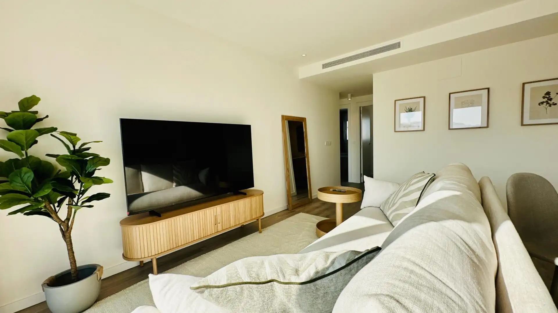 Sala d'estar de Apartament en venda en Finestrat amb Aire condicionat, Jardí privat i Terrassa