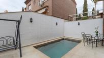 Swimming pool of Single-family semi-detached for sale in  Granada Capital  with Heating, Private garden and Terrace