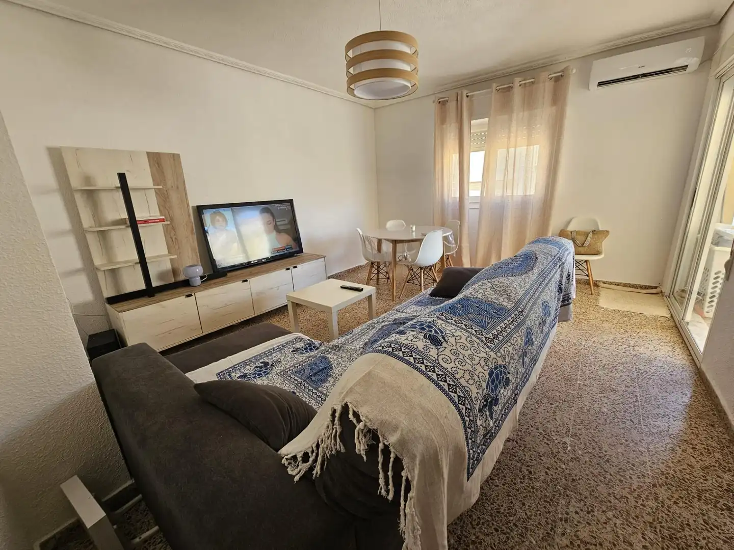 Sala de estar de Piso en venta en Tavernes de la Valldigna con Aire acondicionado, Terraza y Amueblado