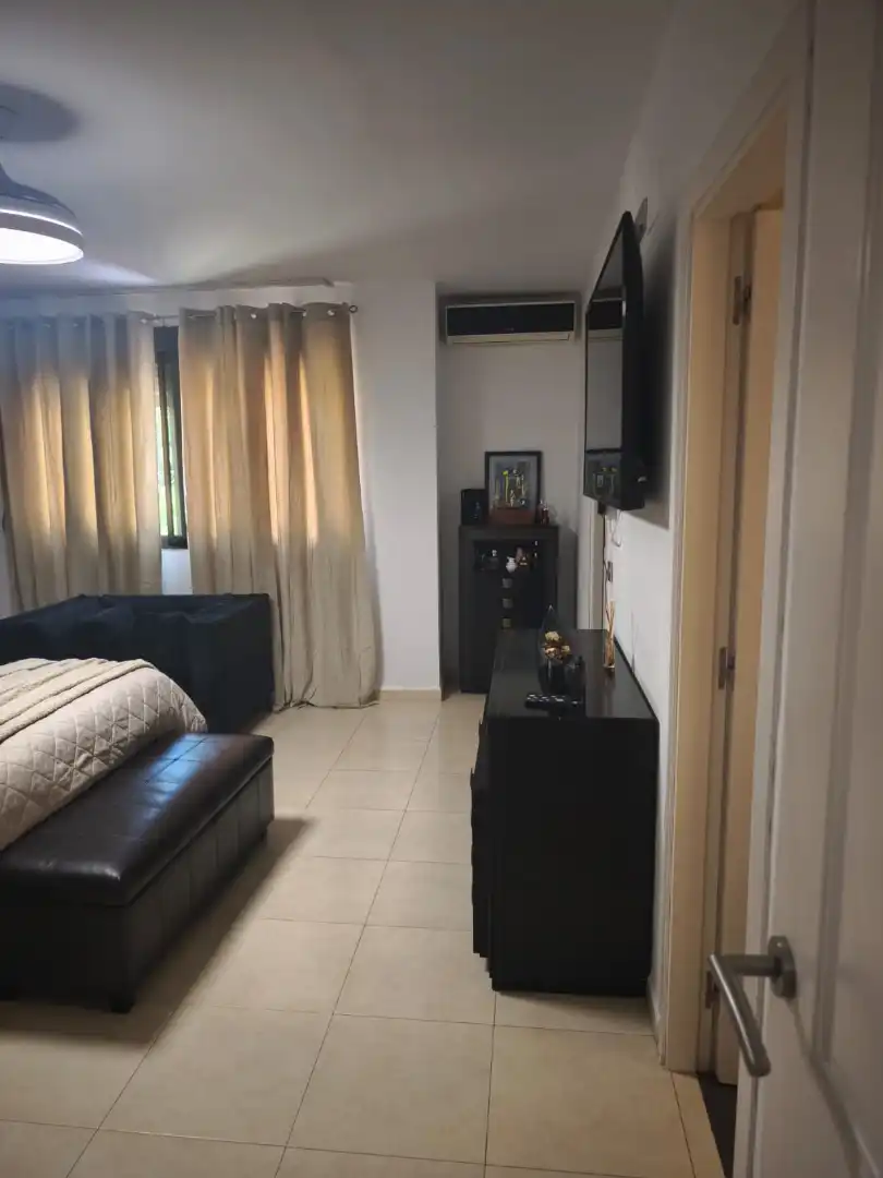 Sala de estar de Casa adosada en venta en Melilla con Aire acondicionado, Jardín privado y Terraza