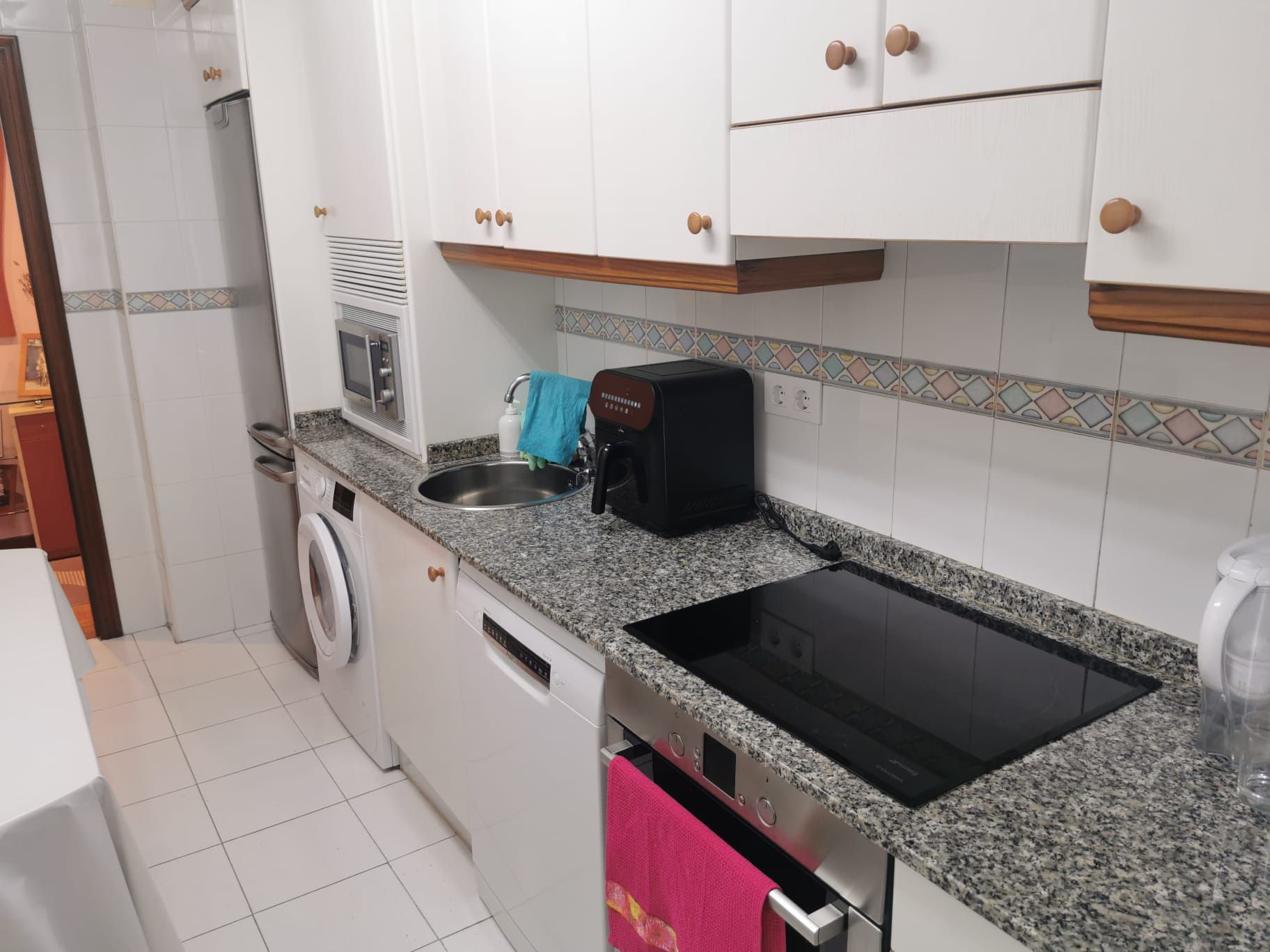 Kitchen of Flat for sale in Gijón   with Heating, Parquet flooring and Storage room