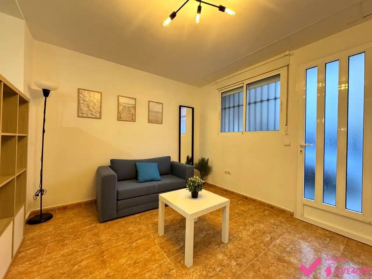 Sala d'estar de Planta baixa de lloguer en Valencia amb Moblat