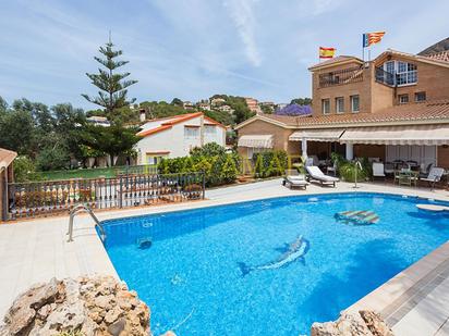 Swimming pool of House or chalet for sale in Cullera  with Air Conditioner, Terrace and Swimming Pool