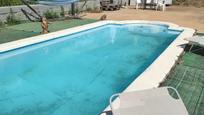 Swimming pool of House or chalet for sale in Riells i Viabrea  with Air Conditioner, Private garden and Storage room