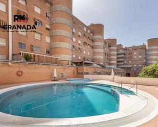 Swimming pool of Flat for sale in  Granada Capital  with Air Conditioner, Heating and Terrace