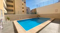 Swimming pool of Flat for sale in Torrevieja  with Air Conditioner, Heating and Terrace