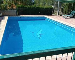 Swimming pool of House or chalet for sale in Chiva  with Air Conditioner, Terrace and Swimming Pool