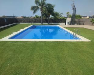 Swimming pool of Single-family semi-detached for sale in Roda de Berà  with Air Conditioner, Heating and Private garden