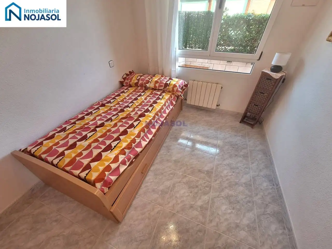 Dormitori de Apartament de lloguer en Noja amb Calefacció, Jardí privat i Terrassa