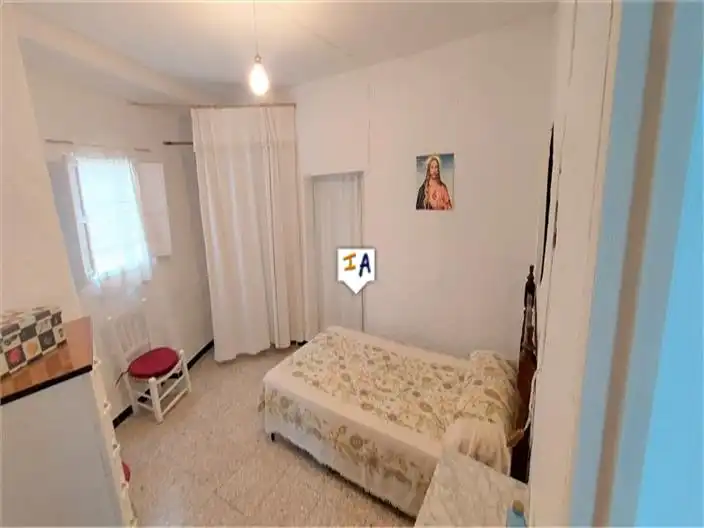 Schlafzimmer von Einfamilien-Reihenhaus zum Verkauf in Almedinilla mit Abstellraum