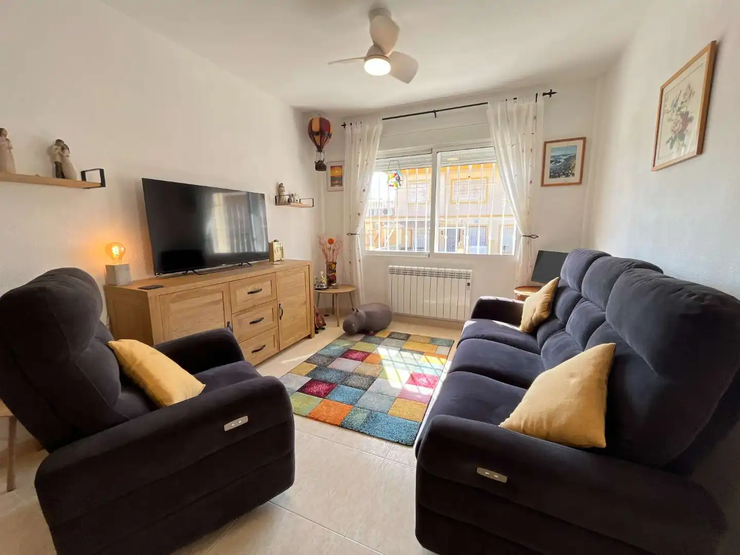 Sala d'estar de Apartament en venda en Orihuela amb Aire condicionat, Piscina i Moblat