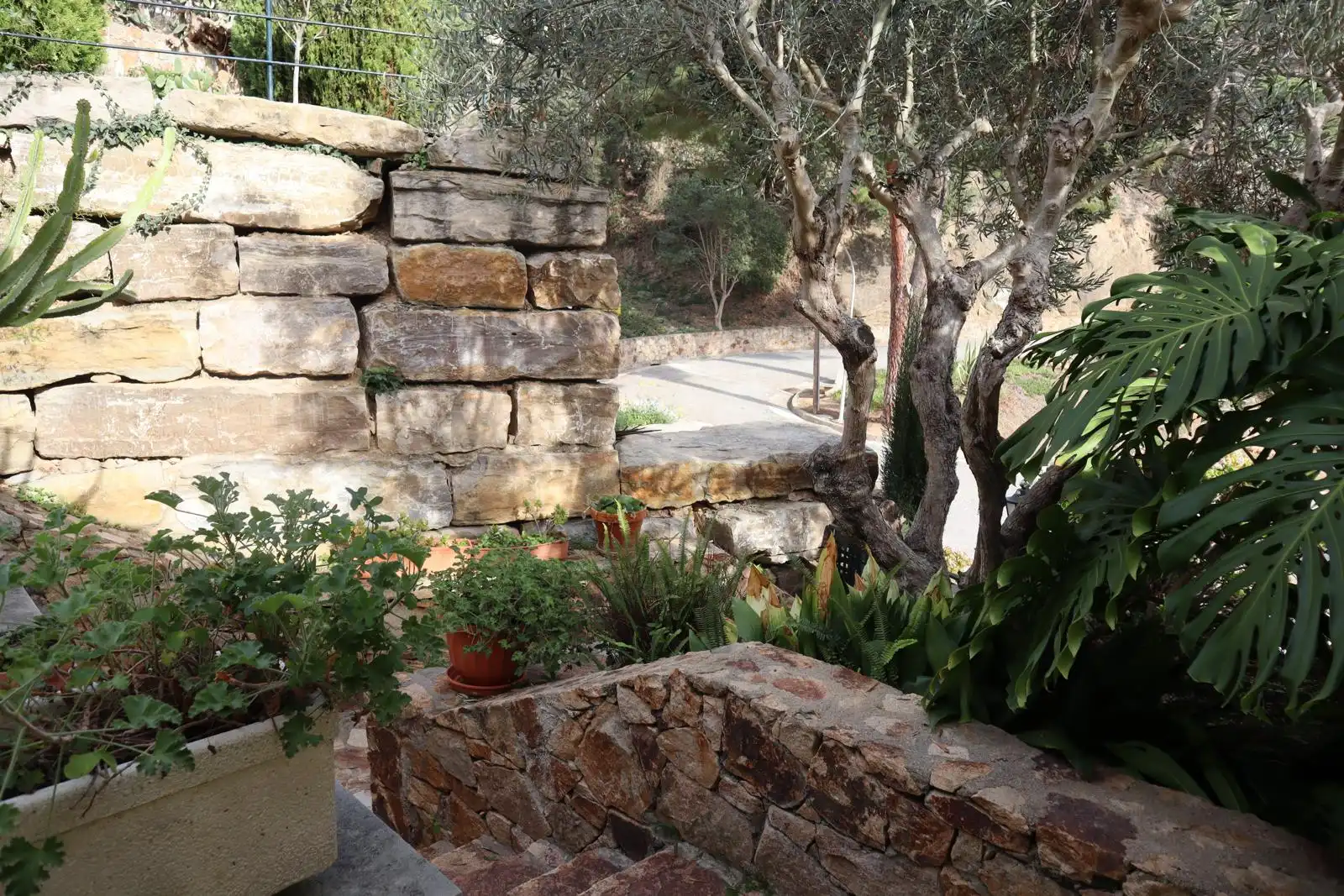 Garten von Einfamilien-Reihenhaus zum Verkauf in Tossa de Mar mit Klimaanlage, Privatgarten und Terrasse