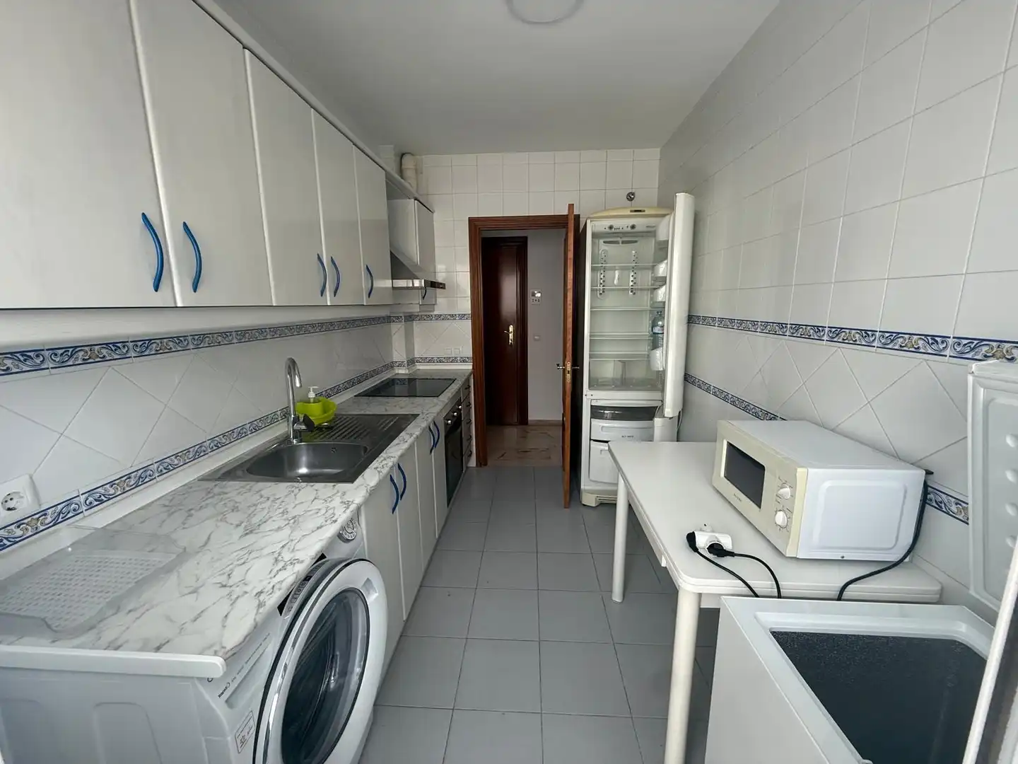 Kitchen of Flat for share in Málaga  with Air Conditioner, Terrace and Furnished