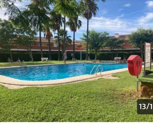 Piscina de Casa adosada de lloguer en Els Poblets amb Aire condicionat i Terrassa