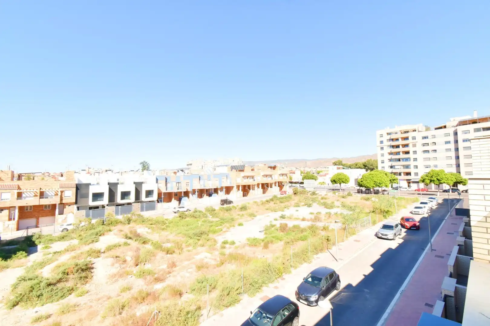 Vista exterior de Casa adosada en venta en Almería con Aire acondicionado, Terraza y Trastero