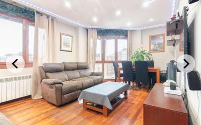 Living room of Flat for sale in Gijón   with Heating, Private garden and Parquet flooring