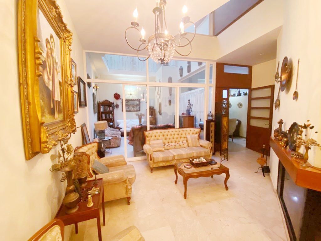 Sala d'estar de Casa adosada en venda en El Puerto de Santa María amb Aire condicionat, Terrassa i Traster