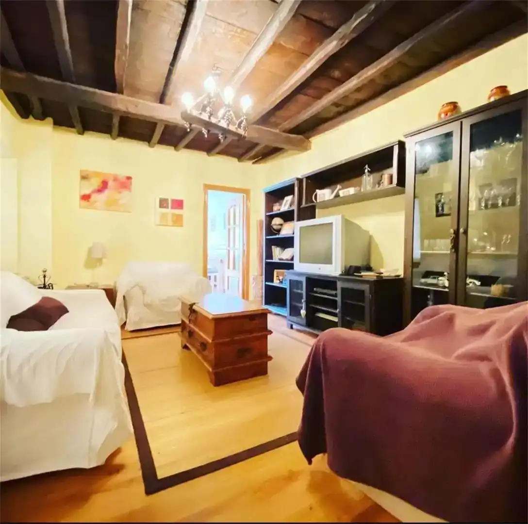 Sala d'estar de Casa o xalet en venda en Ponferrada amb Parquet, TV i Balcó