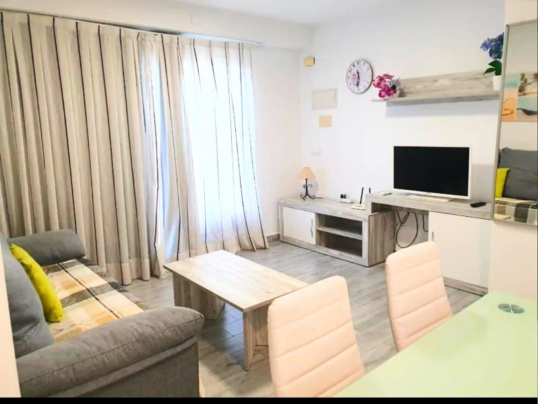 Sala de estar de Apartamento en venta en Gandia con Aire acondicionado, Calefacción y Amueblado