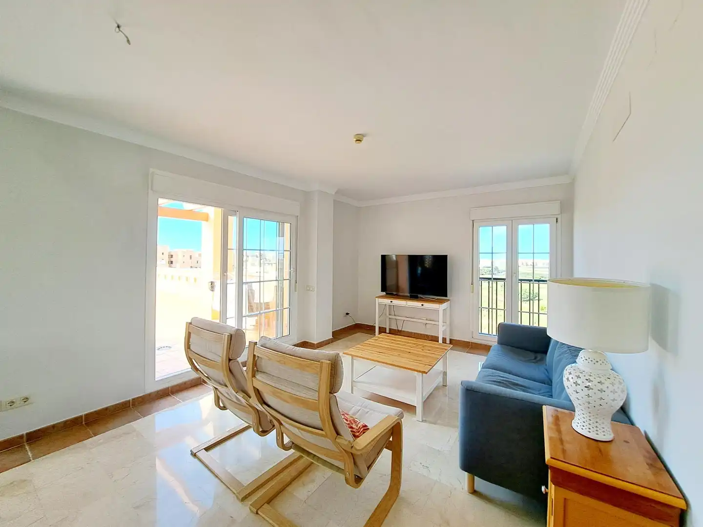 Sala de estar de Ático en venta en Ayamonte con Terraza y Piscina comunitaria