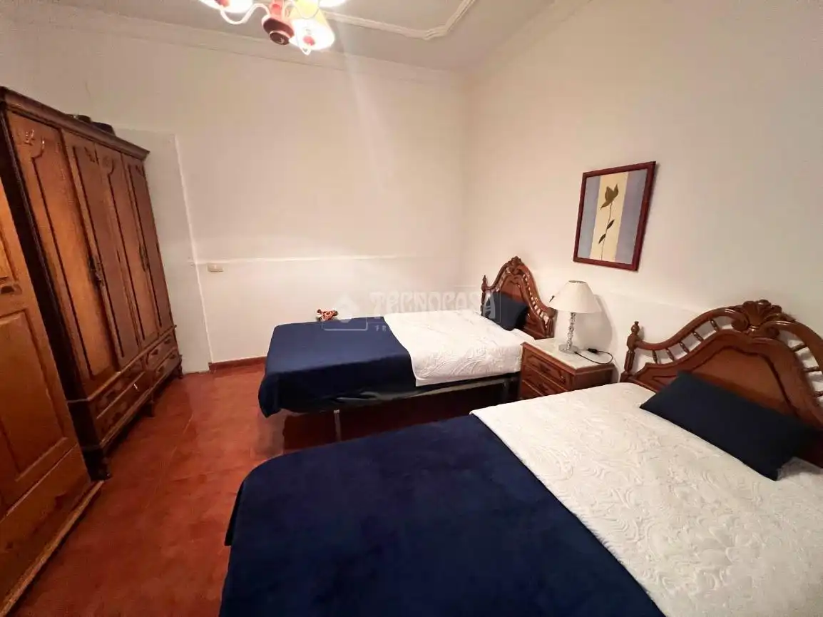 Dormitori de Casa adosada en venda en Santa Lucía de Tirajana amb Aire condicionat, Terrassa i Traster