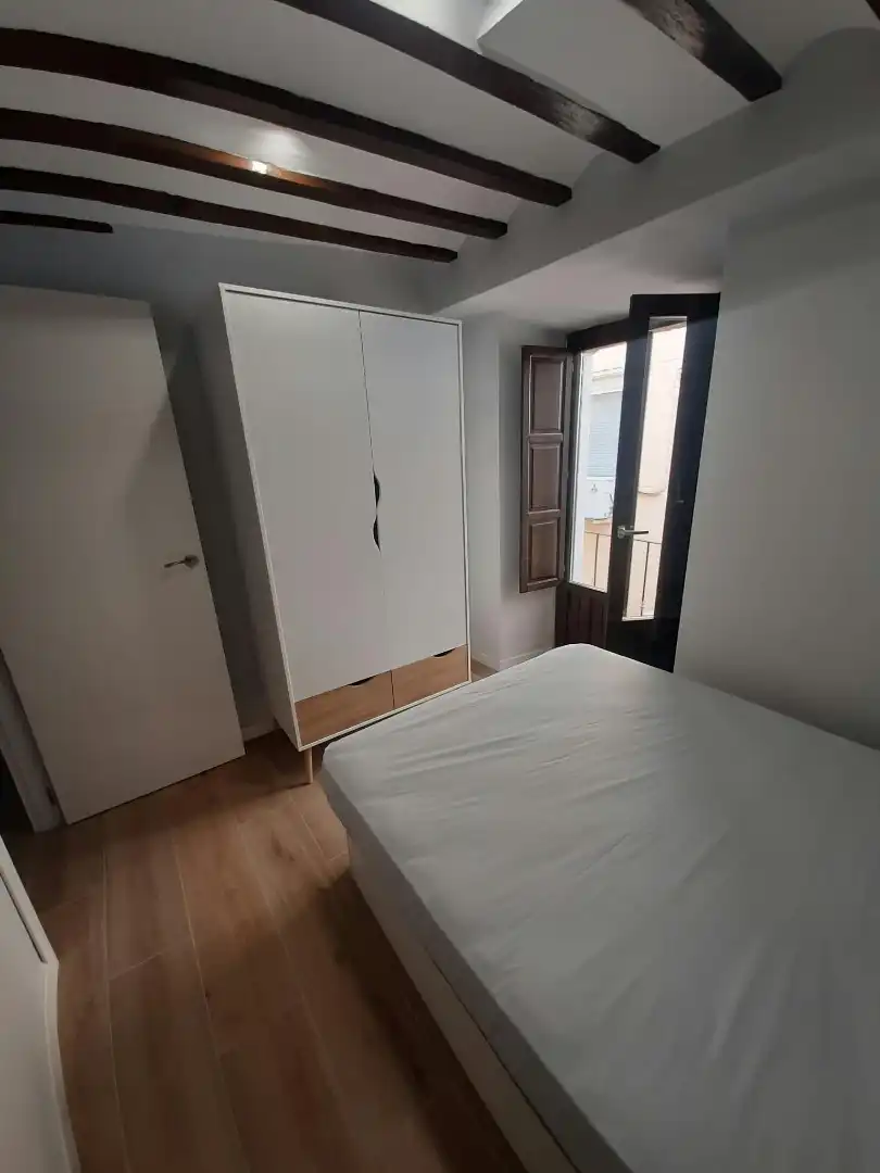 Dormitori de Apartament de lloguer en Úbeda amb Aire condicionat, Calefacció i Moblat