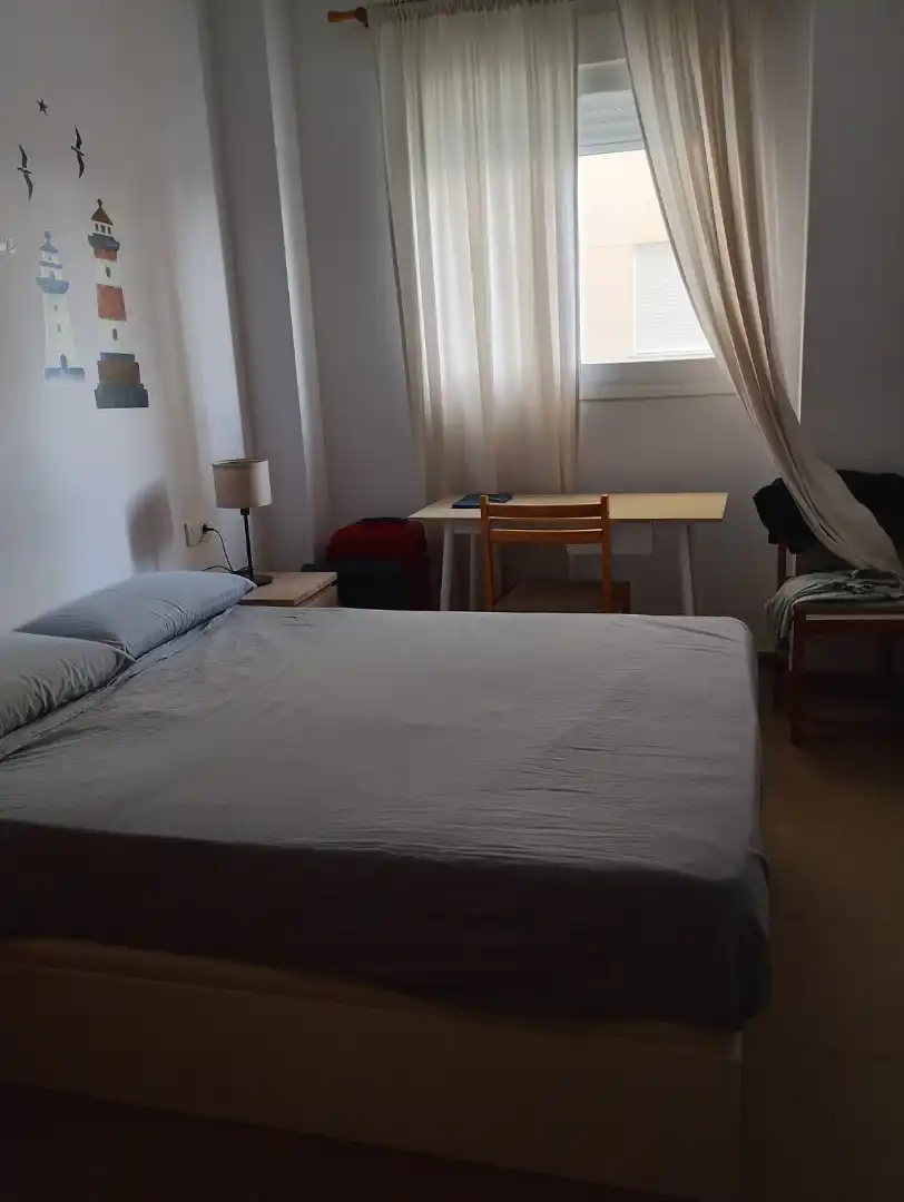 Dormitori de Apartament de lloguer en Piles amb Aire condicionat, Moblat i Forn