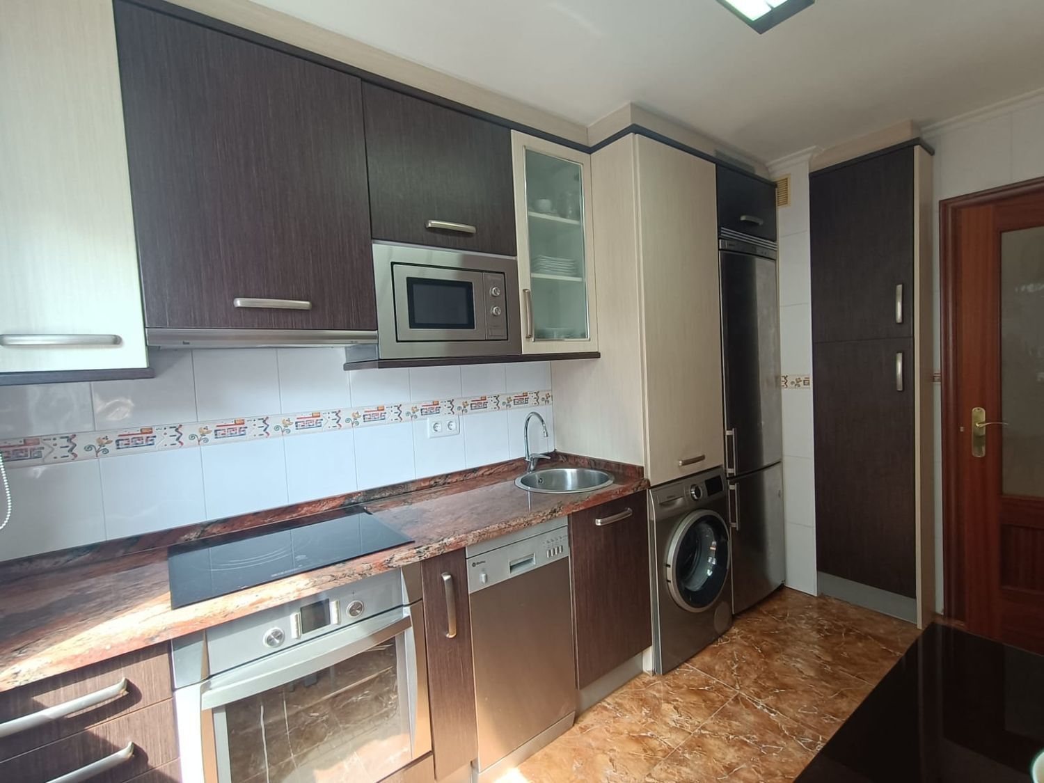 Cocina de Piso en venta en Gijón  con Calefacción, Trastero y Piscina
