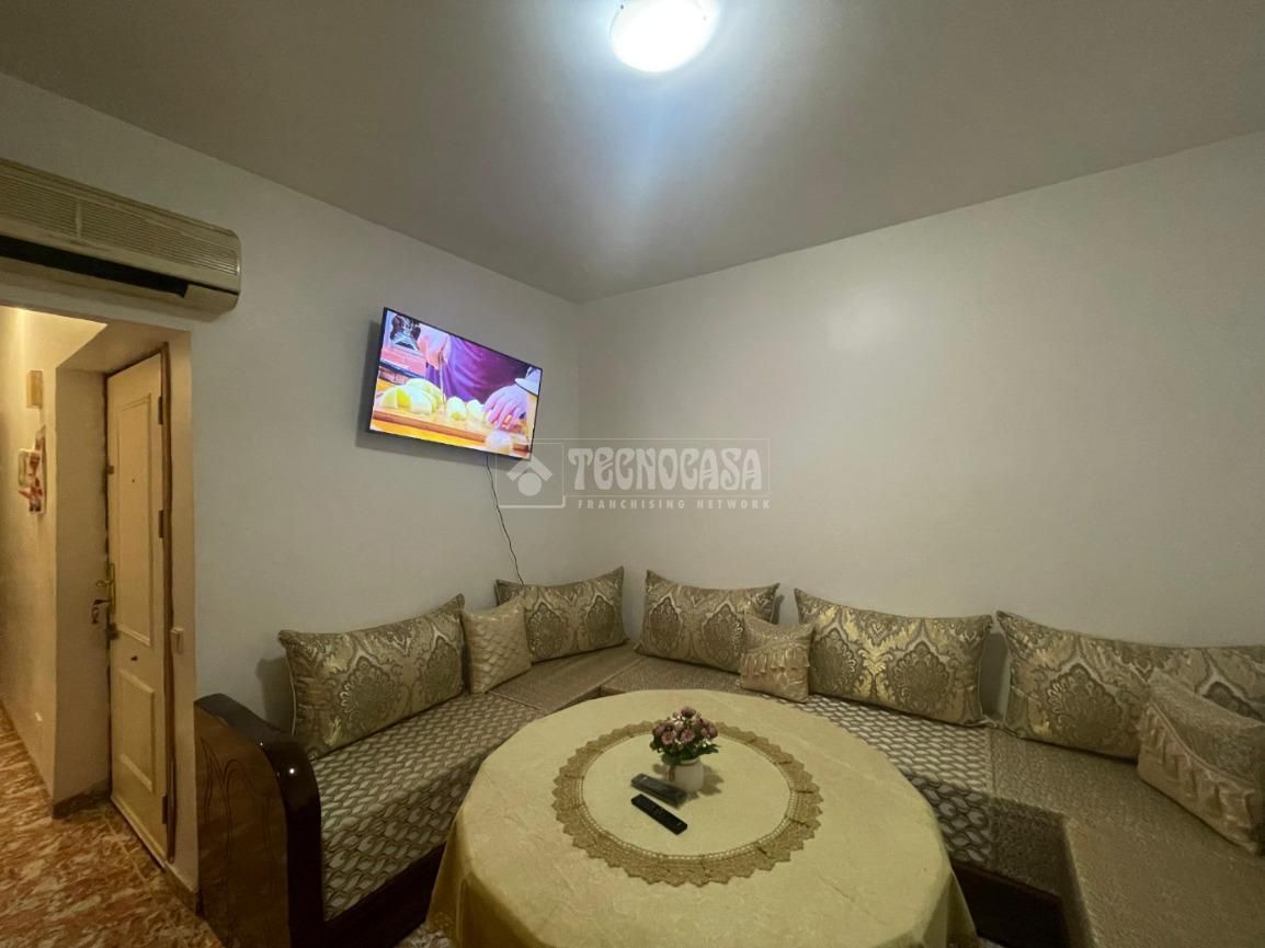 Living room of Flat for sale in Roquetas de Mar
