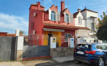 Exterior view of Single-family semi-detached for sale in Gines  with Air Conditioner, Heating and Private garden