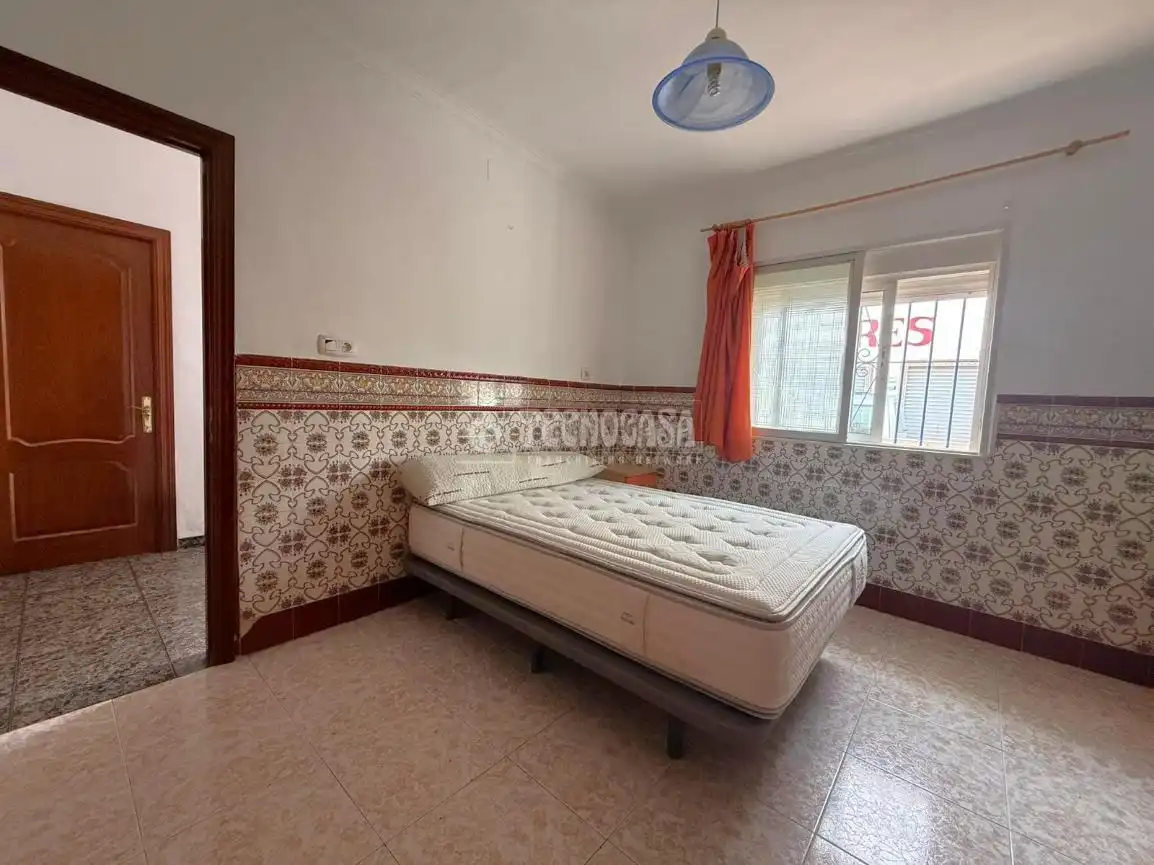 Dormitori de Casa adosada en venda en Málaga amb Jardí privat