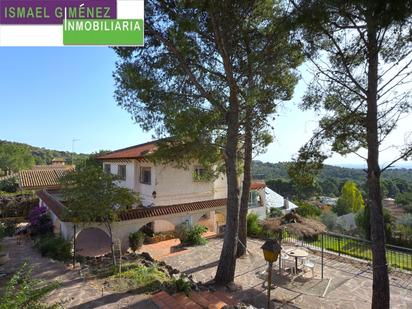 Vista exterior de Casa o xalet en venda en Náquera amb Jardí privat, Terrassa i Piscina