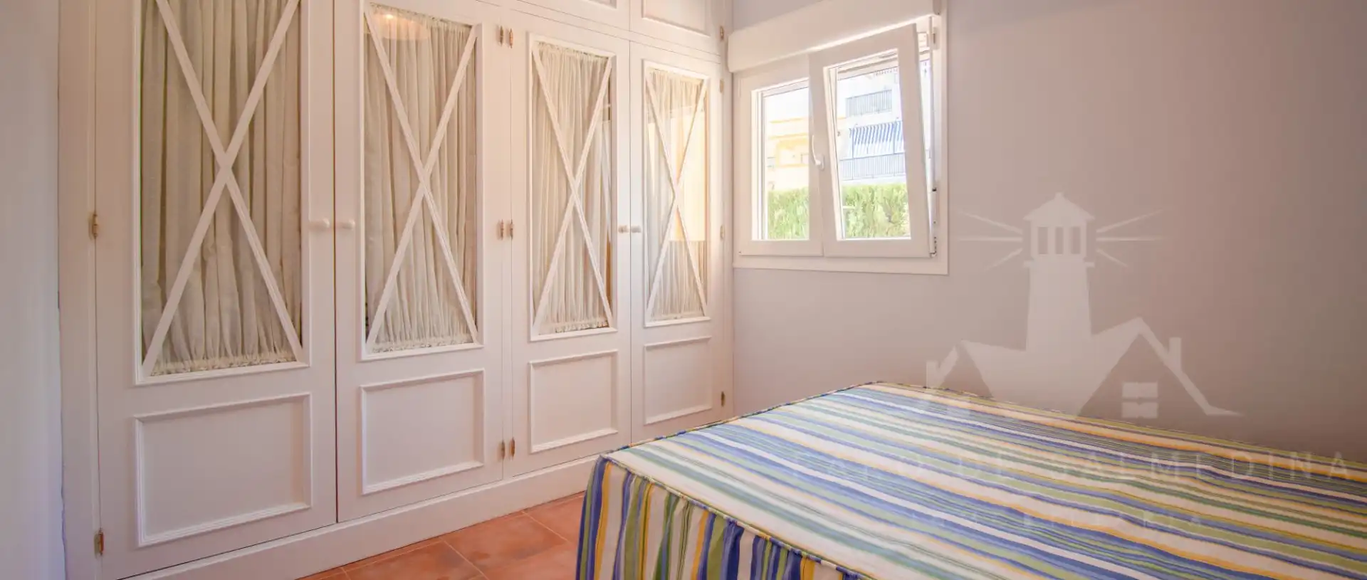 Habitación de Casa adosada en venta en Rota con Aire acondicionado, Terraza y Piscina comunitaria