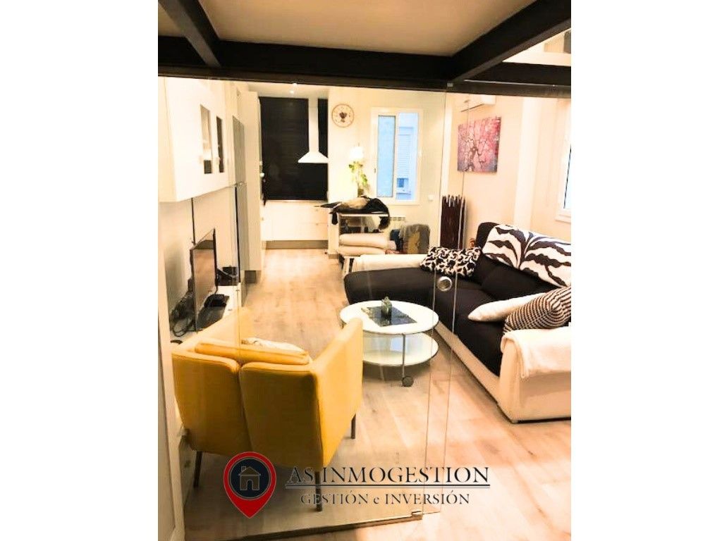 Sala d'estar de Dúplex de lloguer en  Madrid Capital
