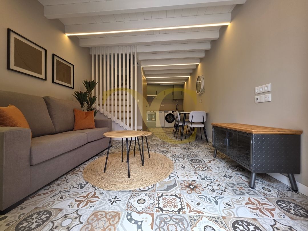 Sala d'estar de Casa adosada en venda en Llanes amb Calefacció, Terrassa i Moblat