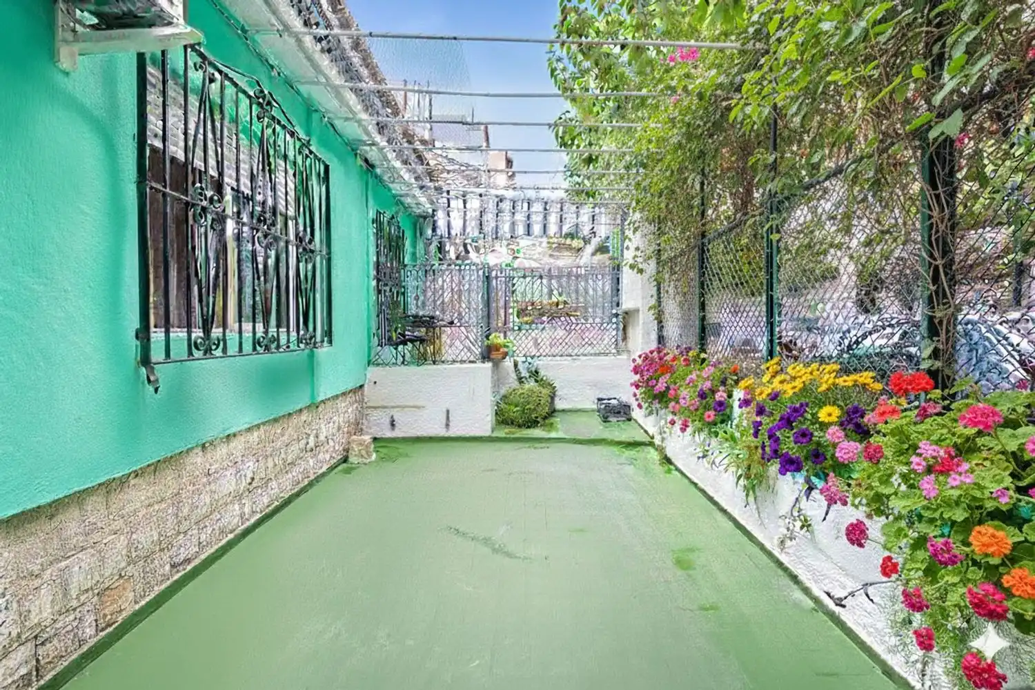 Garten von Einfamilien-Reihenhaus zum Verkauf in Benidorm mit Klimaanlage, Terrasse und Abstellraum