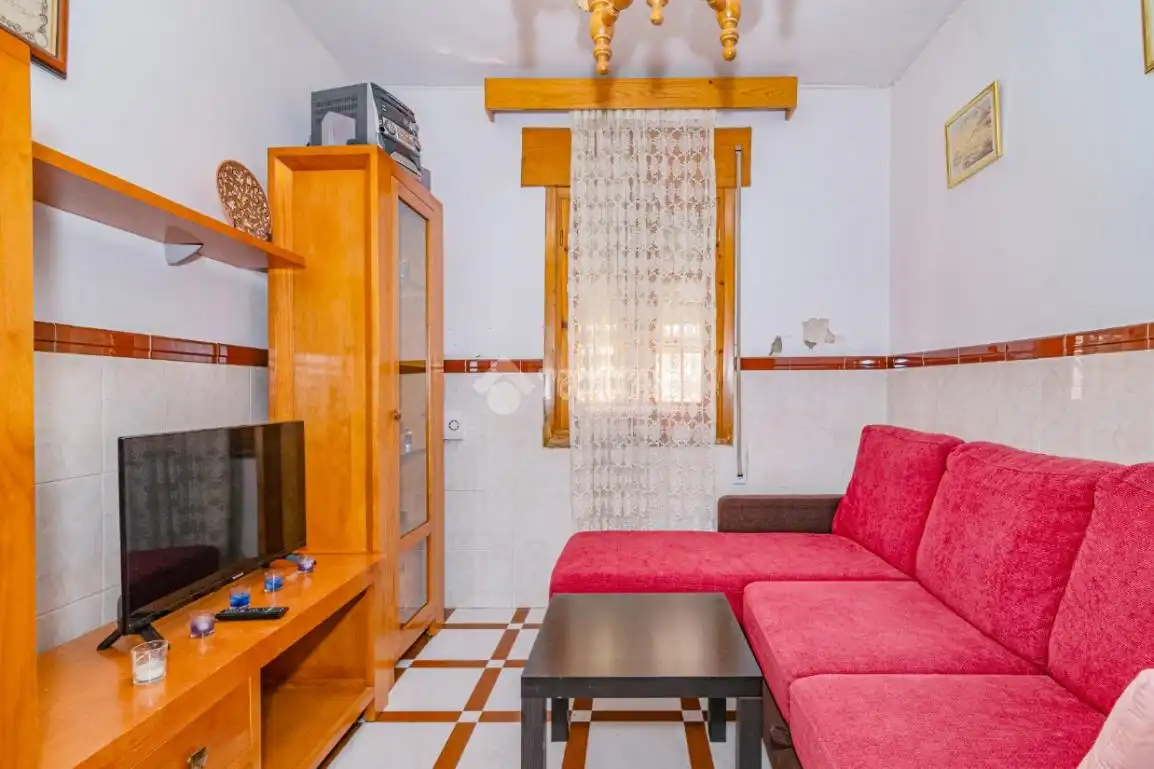 Sala de estar de Casa adosada en venta en Lucena con Aire acondicionado y Amueblado