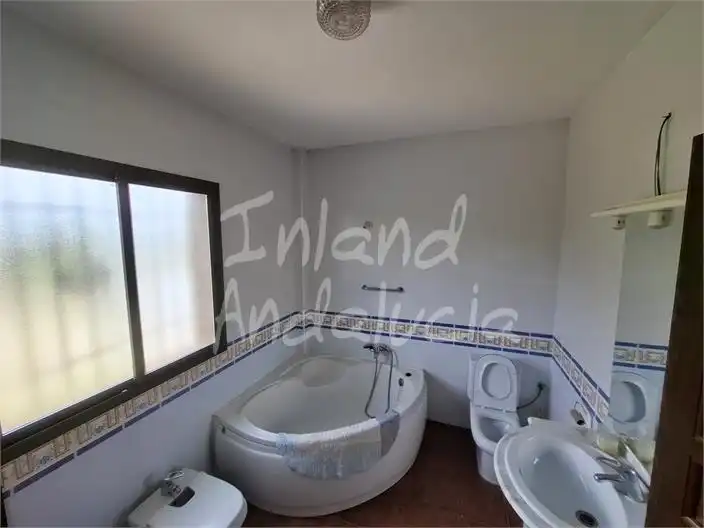 Bany de Casa o xalet en venda en Loja amb Aire condicionat, Terrassa i Piscina