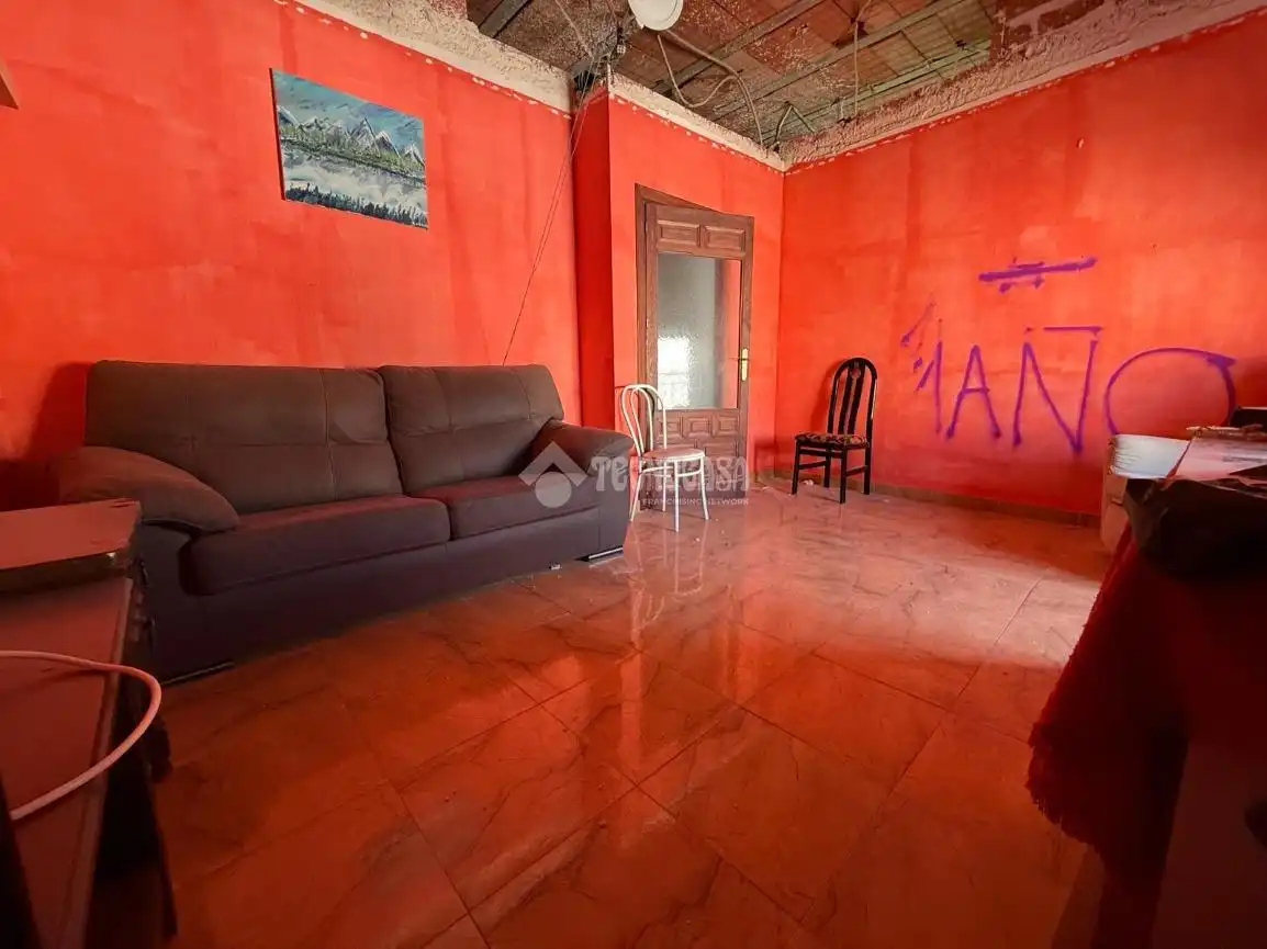 Sala d'estar de Casa adosada en venda en La Carolina amb Alarma