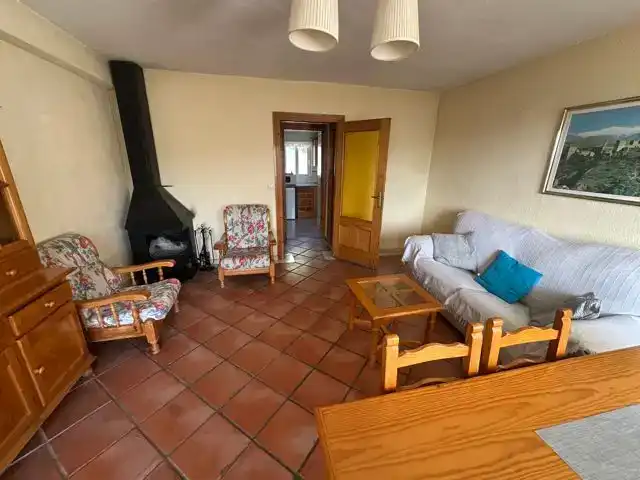Sala d'estar de Casa adosada en venda en Zona media