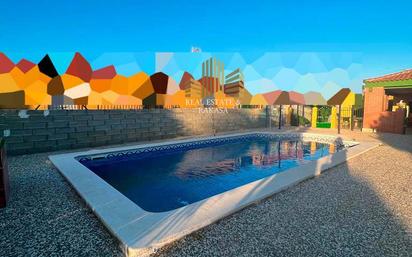 Swimming pool of Country house for sale in Utrera