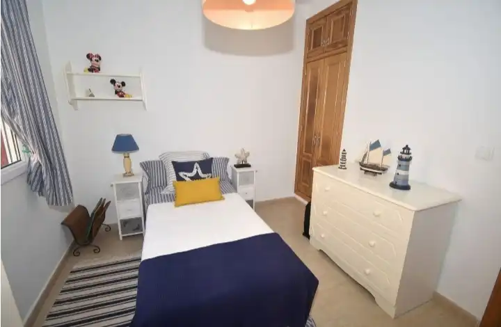 Habitación de Casa adosada en venta en Pilar de la Horadada con Aire acondicionado, Calefacción y Jardín privado