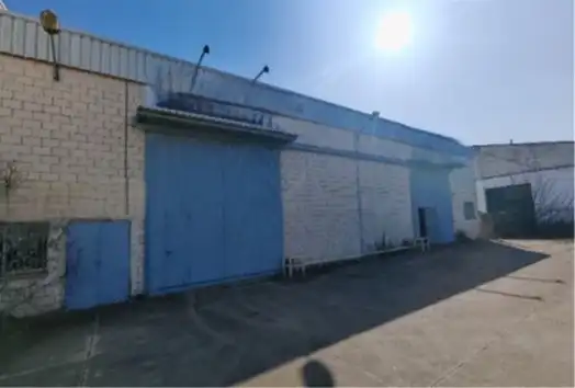 Außenansicht von Fabrikhallen zum Verkauf in Cáceres mit Alarm